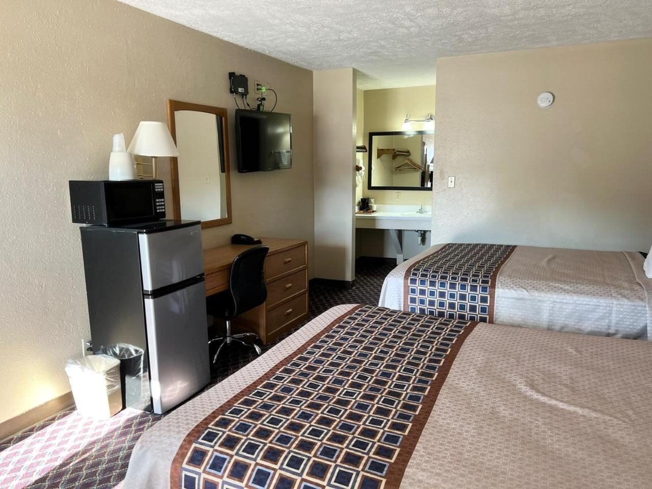 Economy Inn Маккук Екстер'єр фото