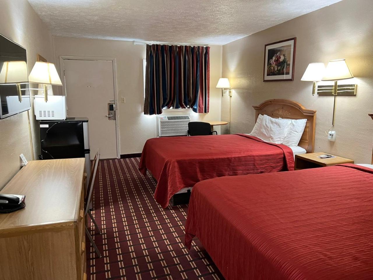 Economy Inn Маккук Екстер'єр фото